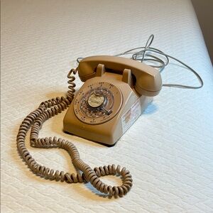 Stromberg-Carlson 1979 Vintage Rotary Dial Telephone peach, long cord hard wired